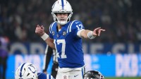 Indianapolis Colts quarterback Daniel Jones (17) gestures before a snap against the Atlanta Falcons during the NFL Berlin Game at Olympic Stadium.