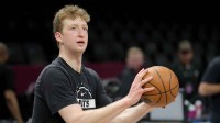 Brooklyn Nets forward Danny Wolf (2) warms up before a game against the Boston Celtics at Barclays Center.