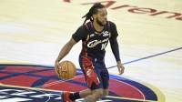 Cleveland Cavaliers guard Darius Garland (10) brings the ball up court in the fourth quarter against the Philadelphia 76ers at Rocket Arena.