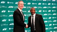 New York Jets General Manager Darren Mougey and Jets Head Coach Aaron Glenn, shake hands as they pose for the press, at the Atlantic Health Jets Training Center, Monday, January 27, 2025, in Florham Park. Mougey and Glenn were introduced to the press in their new positions for the first time.