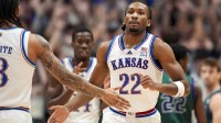 Kansas Jayhawks guard Darryn Peterson (22) reacts after scoring during the first half against the Green Bay Phoenix at Allen Fieldhouse.