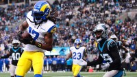 Los Angeles Rams wide receiver Davante Adams (17) makes a catch for a touchdown during the second quarter against the Carolina Panthers at Bank of America Stadium.