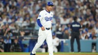 Los Angeles Dodgers manager Dave Roberts (30) walks to the mound in the seventh inning against the Toronto Blue Jays during game four of the 2025 MLB World Series at Dodger Stadium.