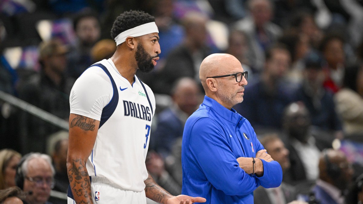 Dallas Mavericks forward Anthony Davis (3) exchanges words with Dallas Mavericks head coach Jason Kidd as Davis walks off the court during the first quarter at the American Airlines Center.