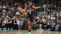 San Antonio Spurs guard De'Aaron Fox (4) directs a play in the first half against the Golden State Warriors at Frost Bank Center.