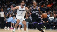 Sacramento Kings guard DeMar DeRozan (10) dribbles as Memphis Grizzlies forward Santi Aldama (7) defends during the second quarter at FedExForum.