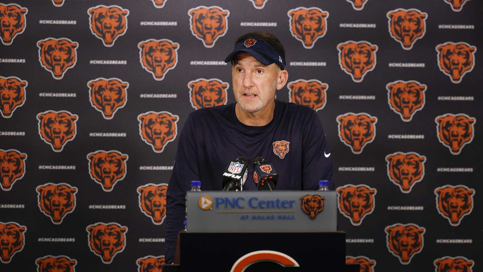 Chicago Bears defensive coordinator Dennis Allen speaks during training camp at Halas Hall. 