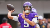 Minnesota Vikings quarterback Desmond Ridder (5) warms up prior to a game against the Cincinnati Bengals at U.S. Bank Stadium.
