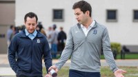 Detroit Tigers president of baseball operations Scott Harris, right, talks with general manager Jeff Greenberg during spring training at Tigertown.