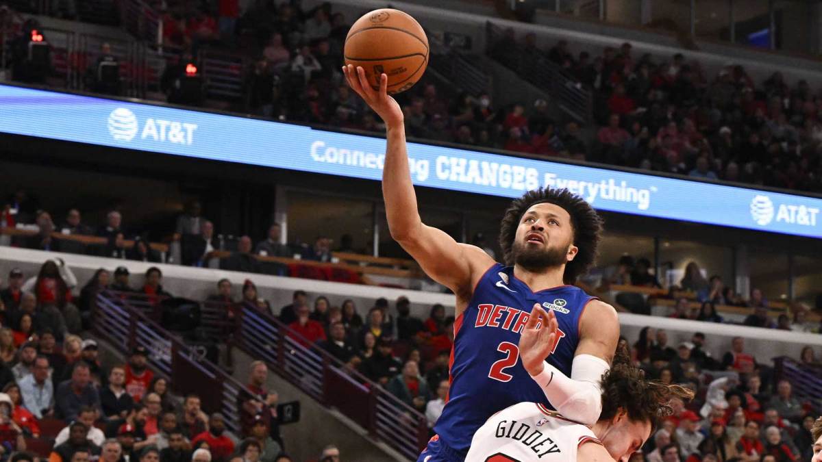Oct 22, 2025; Chicago, Illinois, USA; Detroit Pistons guard Cade Cunningham (2) shoots over Chicago Bulls guard Josh Giddey (3) during the second half at United Center. Mandatory Credit: Matt Marton-Imagn Images