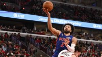 Oct 22, 2025; Chicago, Illinois, USA; Detroit Pistons guard Cade Cunningham (2) shoots over Chicago Bulls guard Josh Giddey (3) during the second half at United Center. Mandatory Credit: Matt Marton-Imagn Images