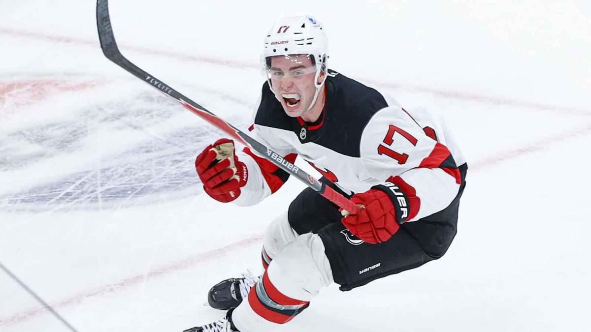 New Jersey Devils defenseman Simon Nemec (17) celebrates after scoring a game winning goal against Chicago Blackhawks goaltender Spencer Knight during the overtime at United Center.