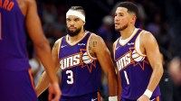 Phoenix Suns guard Devin Booker (1) and forward Dillon Brooks (3) during the second half against the Sacramento Kings at the Mortgage Matchup Center.