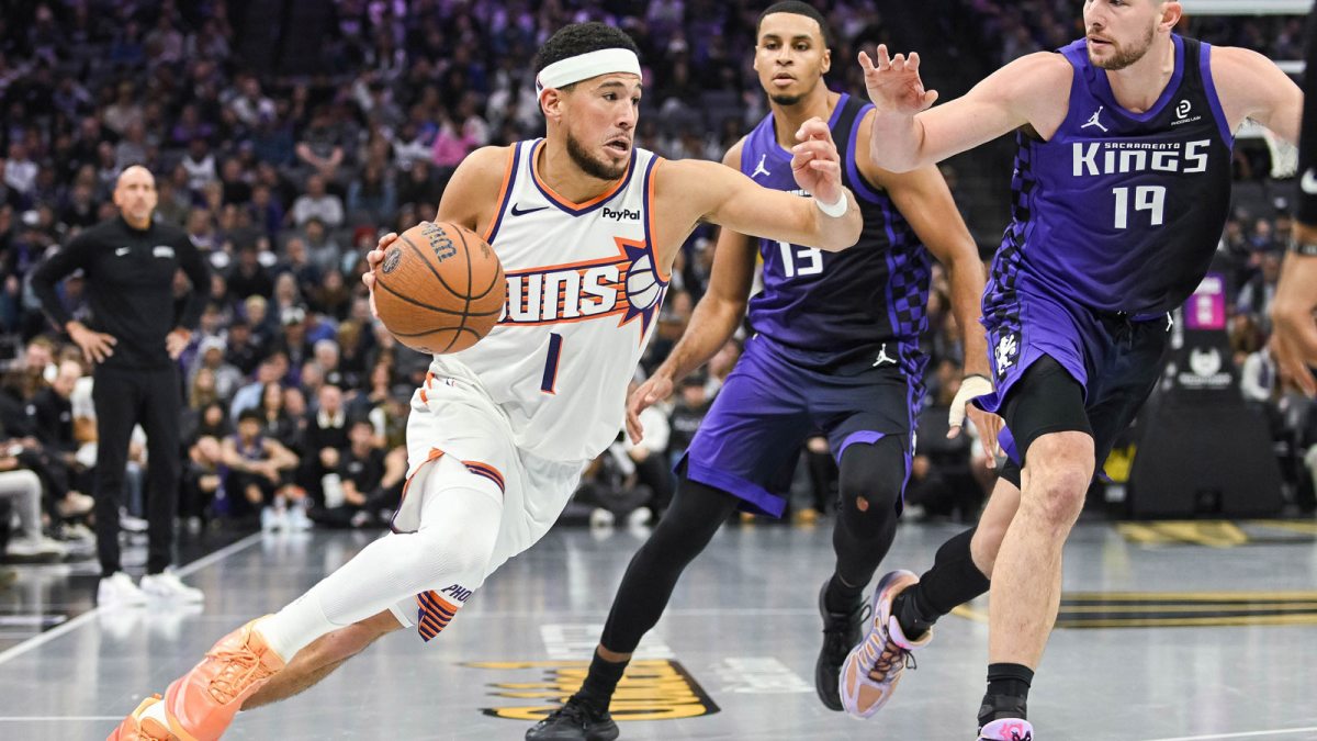 Phoenix Suns guard Devin Booker (1) drives to the basket against the Sacramento Kings during the second quarter at Golden 1 Center.
