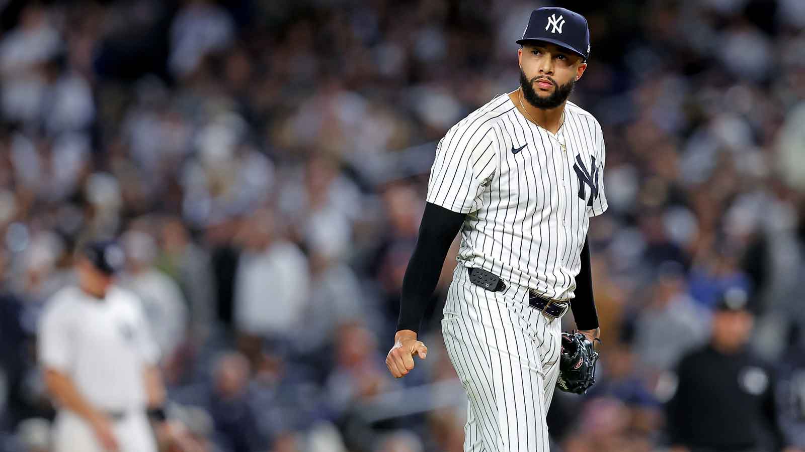 New York Yankees pitcher Devin Williams (38) reacts after giving up a two run RBI during the seventh inning during game four of the ALDS round for the 2025 MLB playoffs at Yankee Stadium.