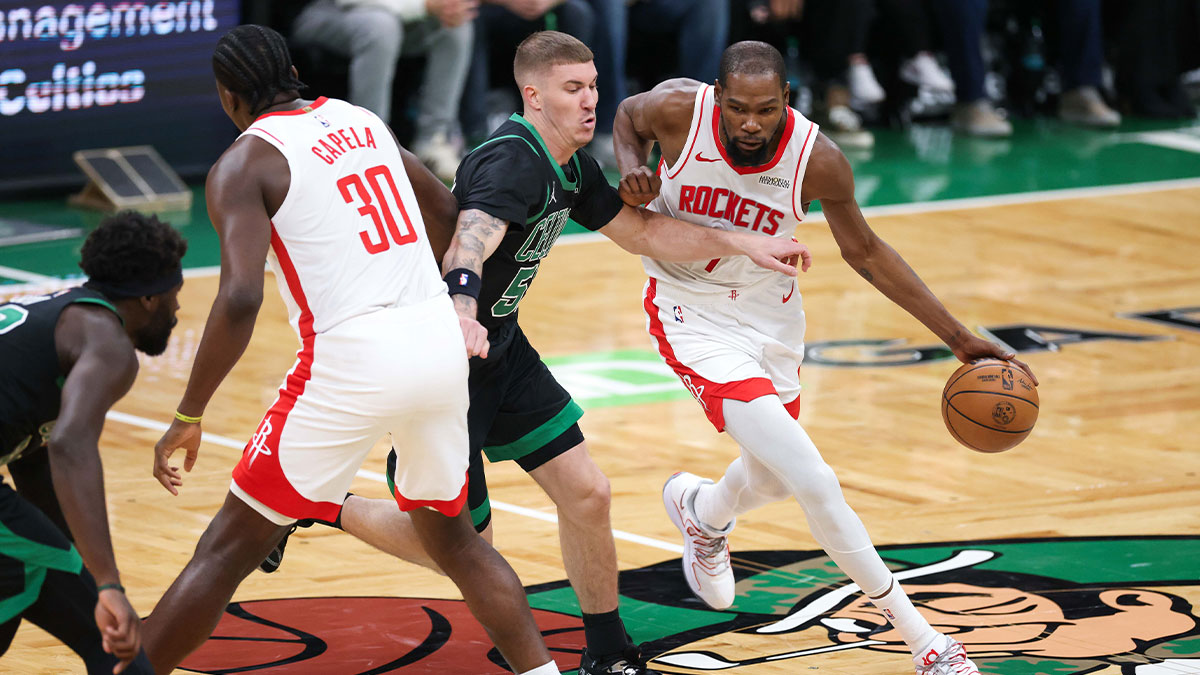Boston Celtics guard Baylor Scheierman (55) defends Houston Rockets forward Kevin Durant (7) during the first half at TD Garden.