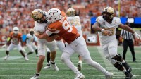 Texas Longhorns defensive lineman Ethan Burke (91) sacks Vanderbilt Commodores quarterback Diego Pavia (2) on the one yard line during the second half at Darrell K Royal-Texas Memorial Stadium. Mandatory Credit: Scott Wachter-Imagn Images