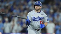 Los Angeles Dodgers third baseman Max Muncy (13) runs after hitting a home run against the Toronto Blue Jays in the eighth inning during game seven of the 2025 MLB World Series at Rogers Centre.