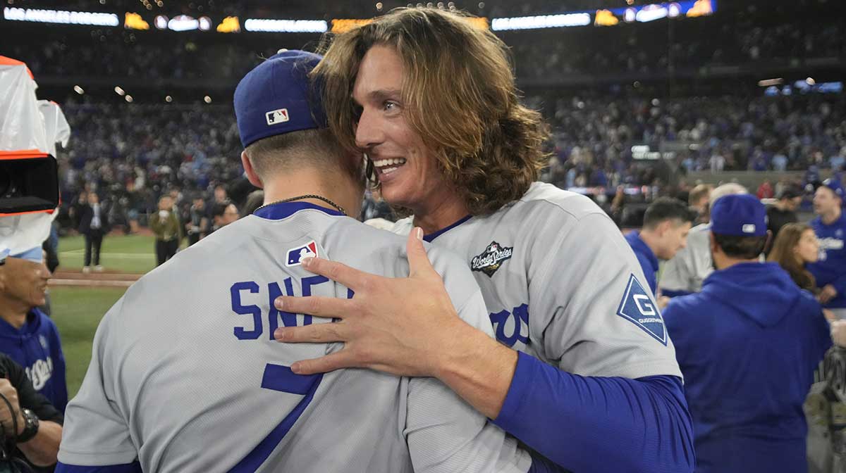 Los Angeles Dodgers pitcher Blake Snell (7) and pitcher Tyler Glasnow (31) celebrate after defeating the Toronto Blue Jays in the 2025 MLB World Series at Rogers Centre.