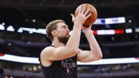 Sacramento Kings forward Domantas Sabonis (11) warms up before an NBA game against the Chicago Bulls at United Center.