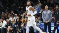 Cleveland Cavaliers guard Donovan Mitchell (45) gestures after making a three point shot in the fourth quarter against the Brooklyn Nets at Barclays Center.