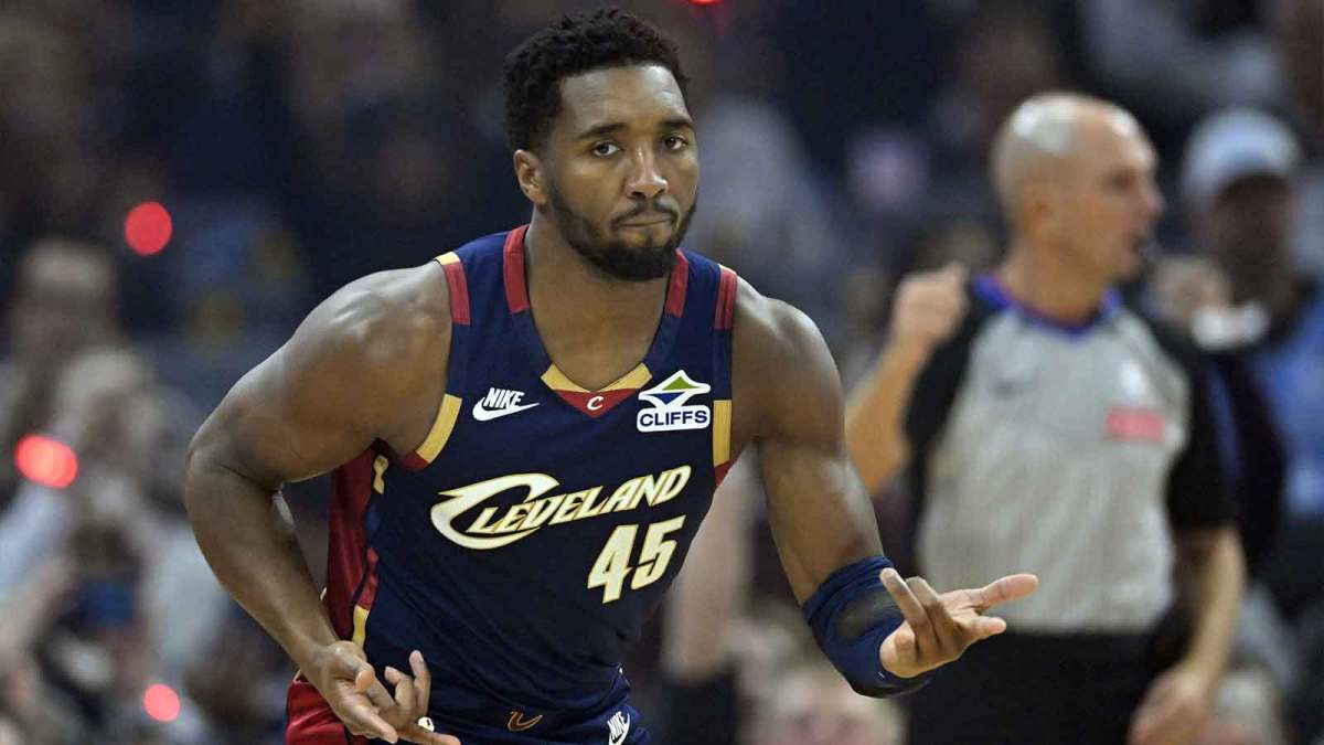Cleveland Cavaliers guard Donovan Mitchell (45) celebrates his three-point basket in the first quarter against the Philadelphia 76ers at Rocket Arena.