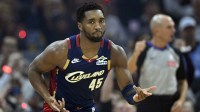 Cleveland Cavaliers guard Donovan Mitchell (45) celebrates his three-point basket in the first quarter against the Philadelphia 76ers at Rocket Arena.