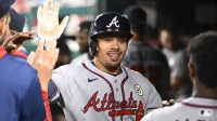 Atlanta Braves catcher Drake Baldwin (30) is congratulated by teammates after hitting a two run home run against the Washington Nationals during the ninth inning at Nationals Park.