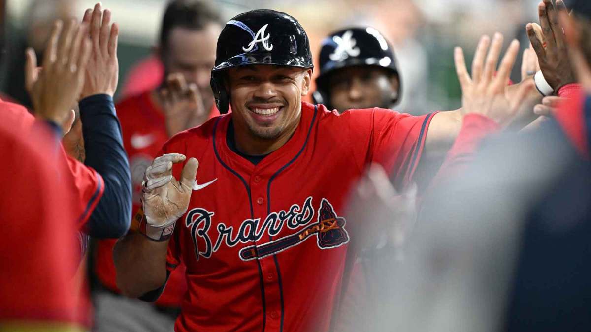 Atlanta Braves catcher Drake Baldwin (30) celebrates in the dugout after hitting a two run home run against the Detroit Tigers in the ninth inning at Comerica Park.