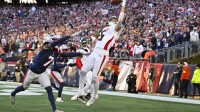 Atlanta Falcons wide receiver Drake London (5) makes a touchdown catch against New England Patriots cornerback Carlton Davis III (7)during the fourth quarter at Gillette Stadium.