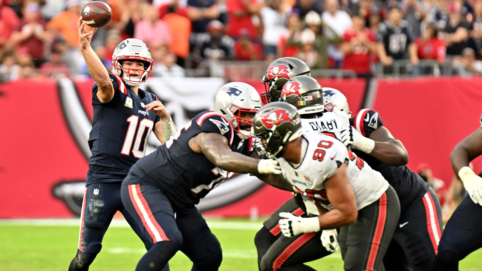 New England Patriots quarterback Drake Maye (10) throws downfield during the fourth quarter against the Tampa Bay Buccaneers at Raymond James Stadium.