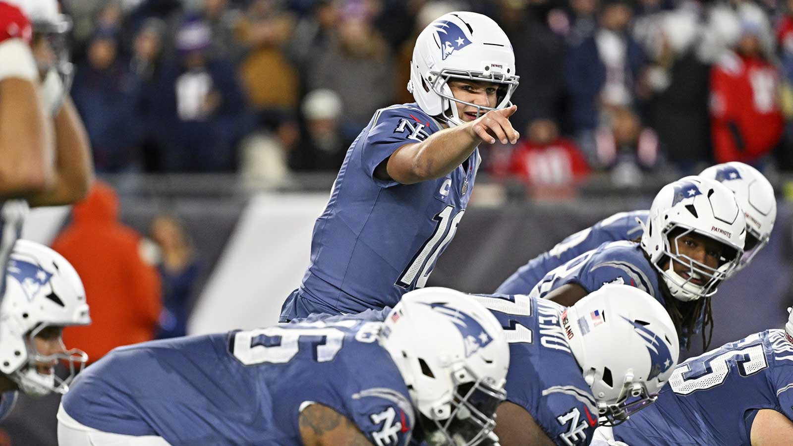 New England Patriots quarterback Drake Maye (10) makes a call during the first half against the New York Jets at Gillette Stadium.
