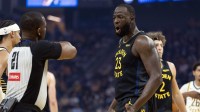 Golden State Warriors forward Draymond Green (23) argues a foul call with referee Dedric Taylor (21) during the first quarter against the Indiana Pacers at Chase Center.