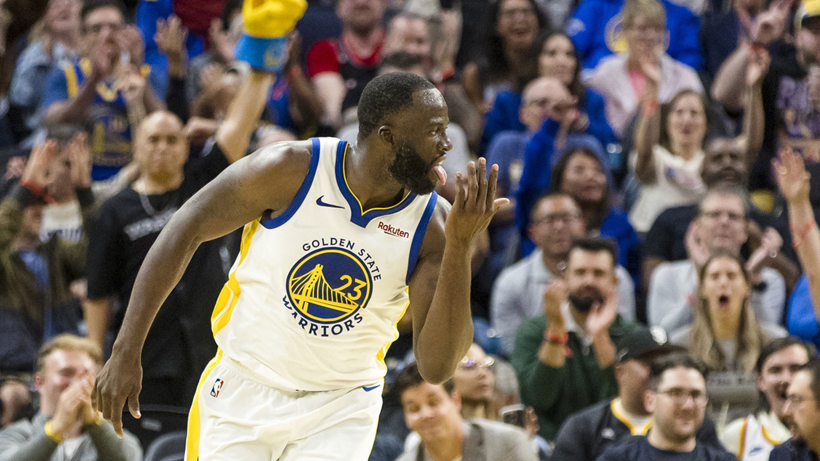 Golden State Warriors forward Draymond Green (23) reacts after scoring against the Portland Trail Blazers during the second quarter at Chase Center.