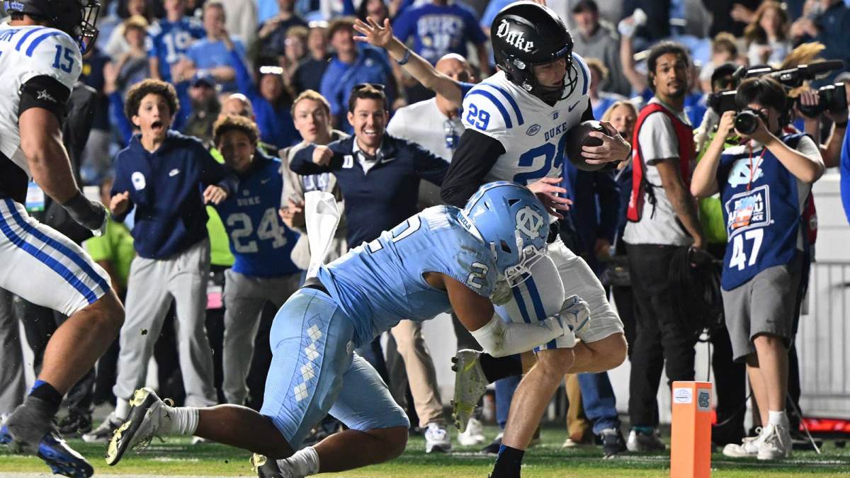 Duke Blue Devils kicker Todd Pelino (29) is pushed out of bounds on a fake field goal during the second half at Kenan Stadium.