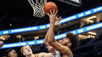 Duke Blue Devils forward Cameron Boozer (12) grabs the rebound against the Texas Longhorns during the second half of the Dick Vitale’s Invitational game at Spectrum Center.