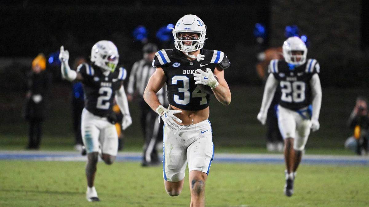 Duke Blue Devils linebacker Luke Mergott (34) reacts after recovering a fumble against the Wake Forest Demon Deacons during the fourth quarter at Wallace Wade Stadium.