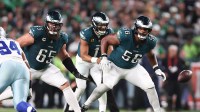 Philadelphia Eagles guard Tyler Steen (56) and offensive tackle Lane Johnson (65) in action against the Dallas Cowboys at Lincoln Financial Field