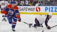 Edmonton Oilers forward Connor McDavid (97) scores a goal during the third period against Columbus Blue Jackets goaltender Jet Greaves (73) (not shown) at Rogers Place.