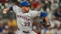 New York Mets relief pitcher Edwin Diaz (39) pitches against the Atlanta Braves during the ninth inning at Truist Park.