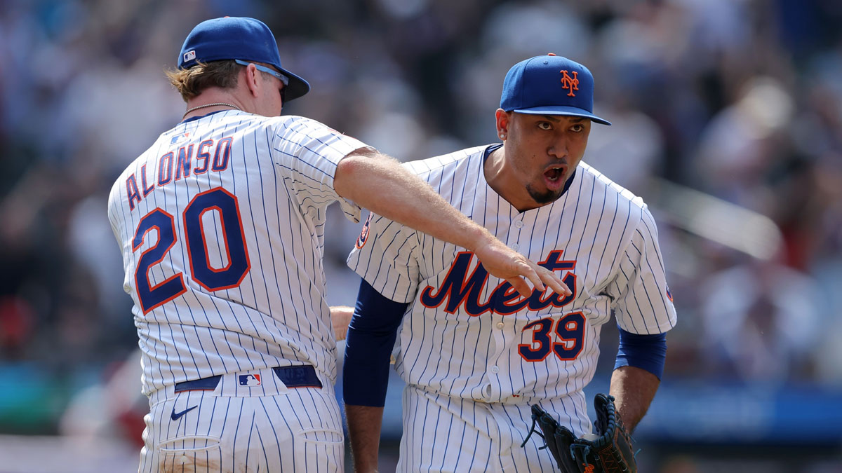 New York Mets first baseman Pete Alonso (20) and relief pitcher Edwin Diaz (39) celebrate after defeating the Washington Nationals at Citi Field.