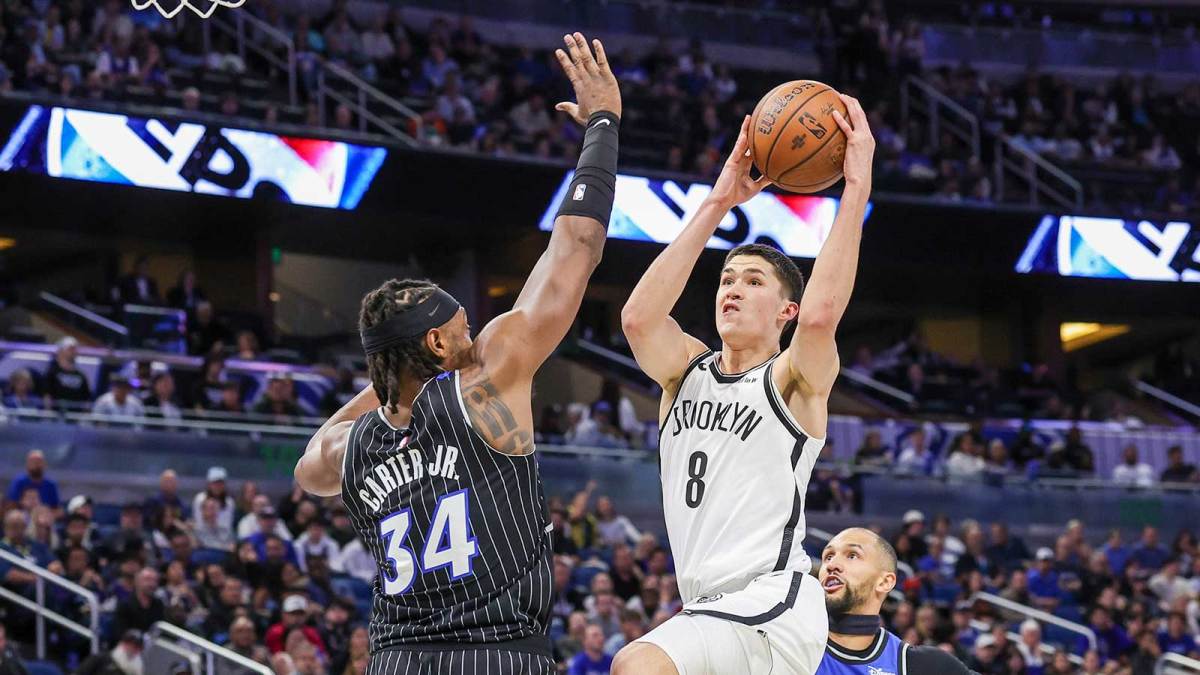 Brooklyn Nets guard Egor Demin (8) goes to the basket against Orlando Magic center Wendell Carter Jr. (34) during the first quarter at Kia Center.