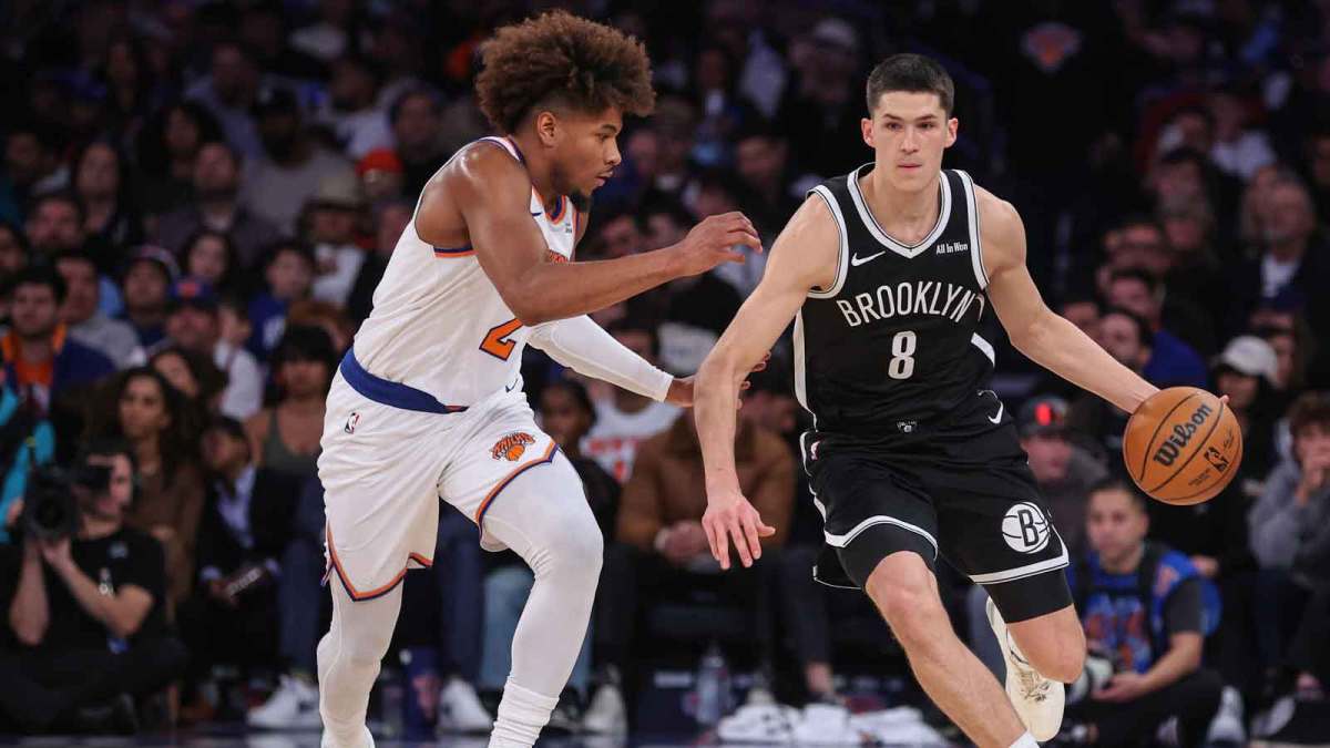 Nov 9, 2025; New York, New York, USA; Brooklyn Nets guard Egor Demin (8) looks to drive past New York Knicks guard Miles McBride (2) in the fourth quarter at Madison Square Garden. Mandatory Credit: Wendell Cruz-Imagn Images