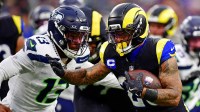 Los Angeles Rams running back Kyren Williams (23) against Seattle Seahawks linebacker Ernest Jones IV (13) during the second half at SoFi Stadium.