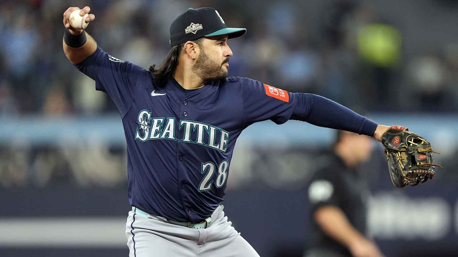 Seattle Mariners third baseman Eugenio Suarez (28) throws out Toronto Blue Jays right fielder George Springer (4) at first base in the second inning during game seven of the ALCS round for the 2025 MLB playoffs at Rogers Centre.