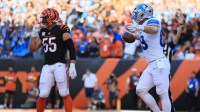 Detroit Lions tight end Brock Wright (89) runs for a touchdown past Cincinnati Bengals linebacker Logan Wilson (55) during the second quarter at Paycor Stadium.