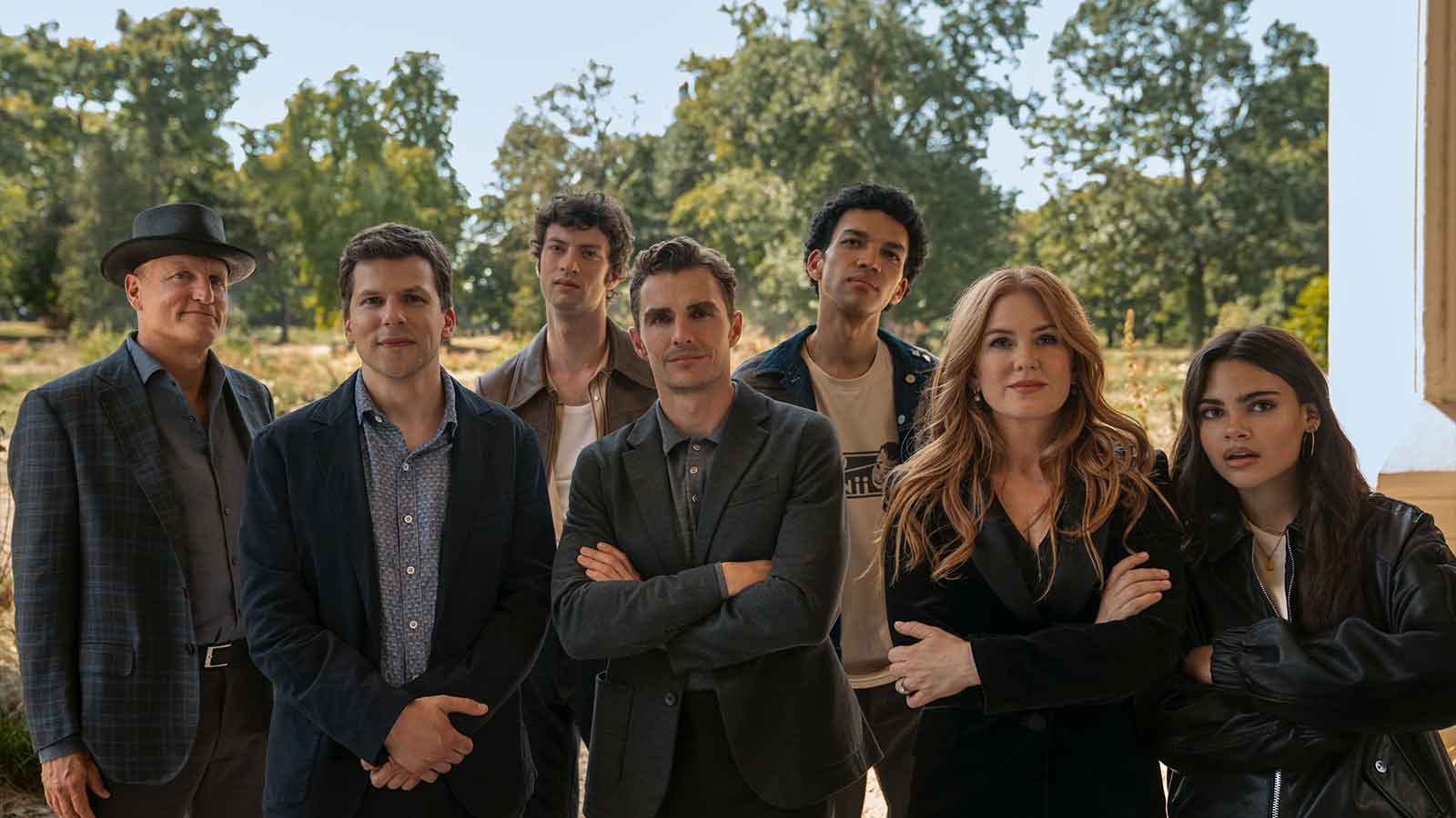 Woody Harrelson, Jesse Eisenberg, Dominic Sessa, Dave Franco, Justice Smith, Isla Fisher, and Ariana Greenblatt in Now You See Me: Now You Don't, the third movie in the franchise.
