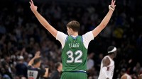 Dallas Mavericks forward Cooper Flagg (32) celebrates a three point basket by guard Max Christie (not pictured) against the Phoenix Suns during the second half at the American Airlines Center.