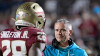 Florida State Seminoles head coach Mike Norvell celebrates a touchdown during the fourth quarter against the Wake Forest Demon Deacons at Doak S. Campbell Stadium.