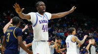 Kansas Jayhawks forward Flory Bidunga (40) reacts on the court against the Notre Dame Fighting Irish during the second half in a 2025 Players Era Festival group play game at MGM Grand Garden Arena.